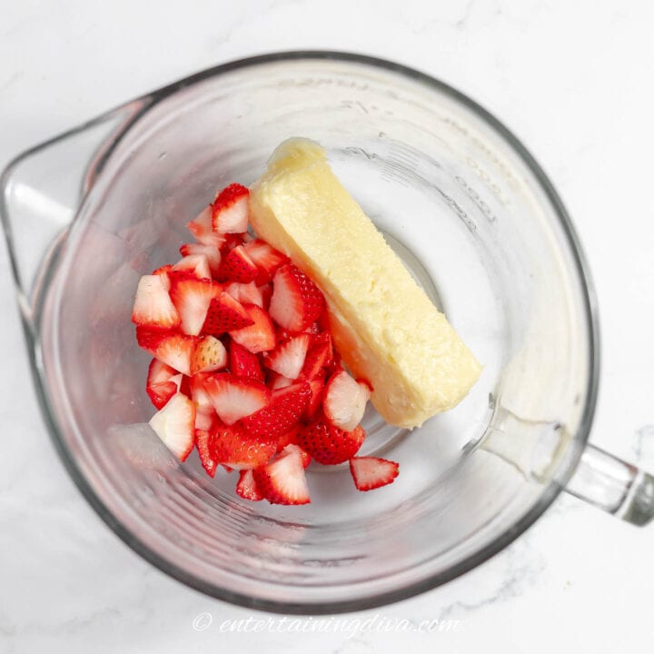 strawberries and butter in a mixing bowl