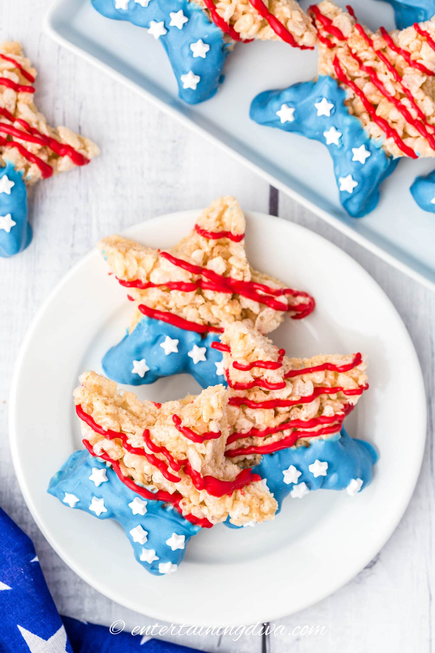 patriotic red, white and blue rice krispie treats on a plate
