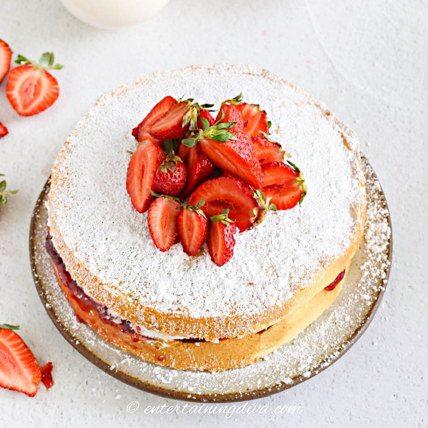 strawberry shortcake cake on a cake plate