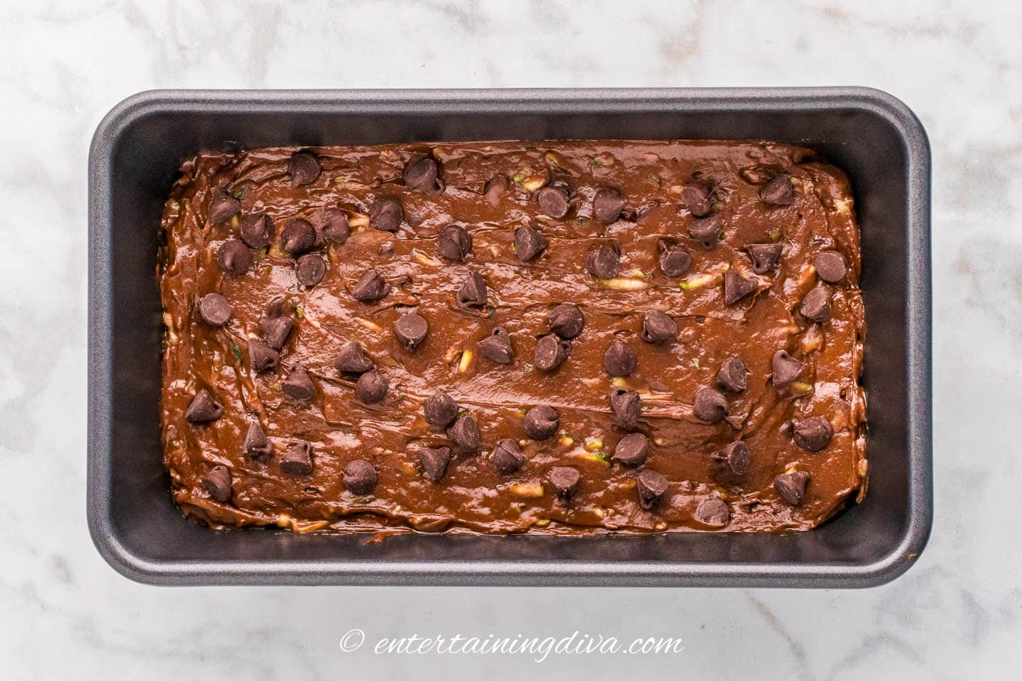 death by chocolate zucchini bread in a loaf pan before baking