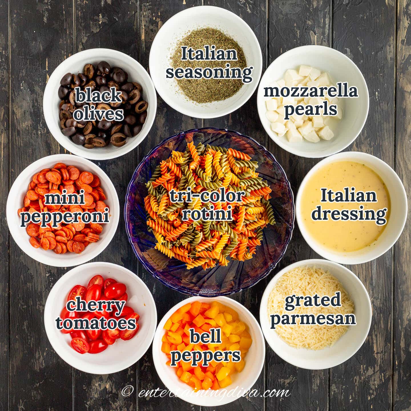 italian pasta salad ingredients in bowls