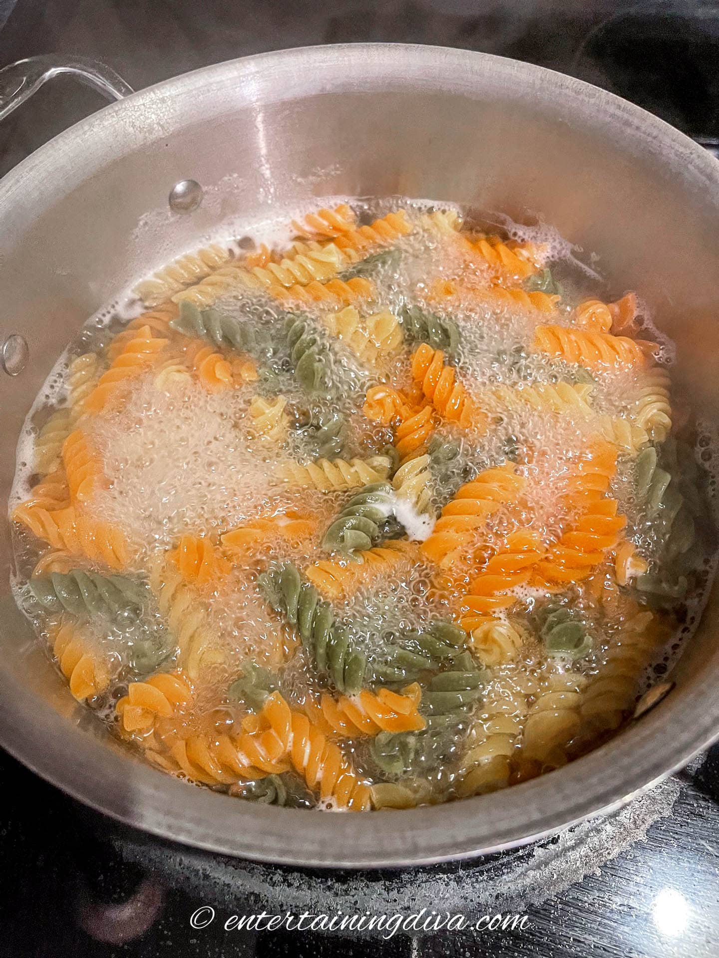 tricolor pasta in a pot of boiling water