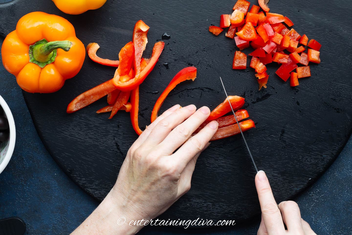red peppers being chopped