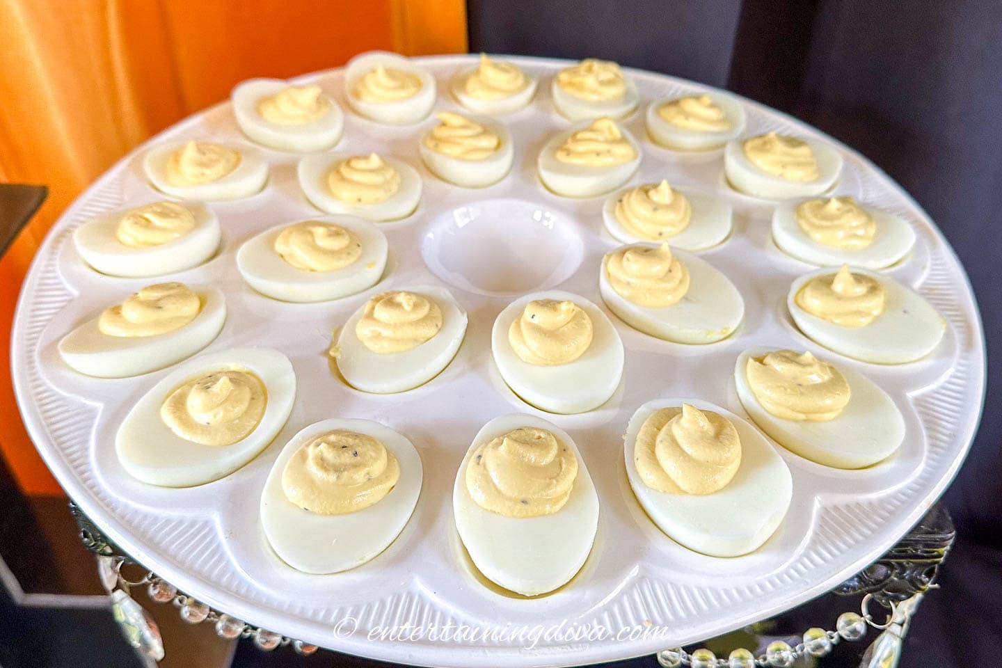 Classic deviled eggs on a deviled egg plate.