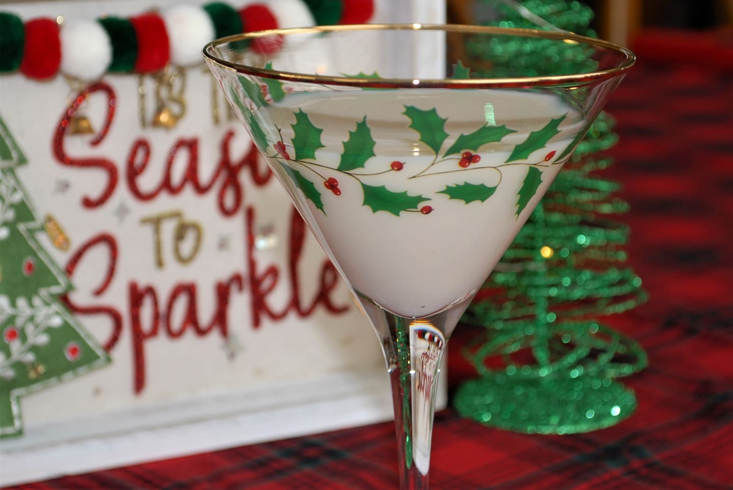 A white snowflake martini in a festive glass