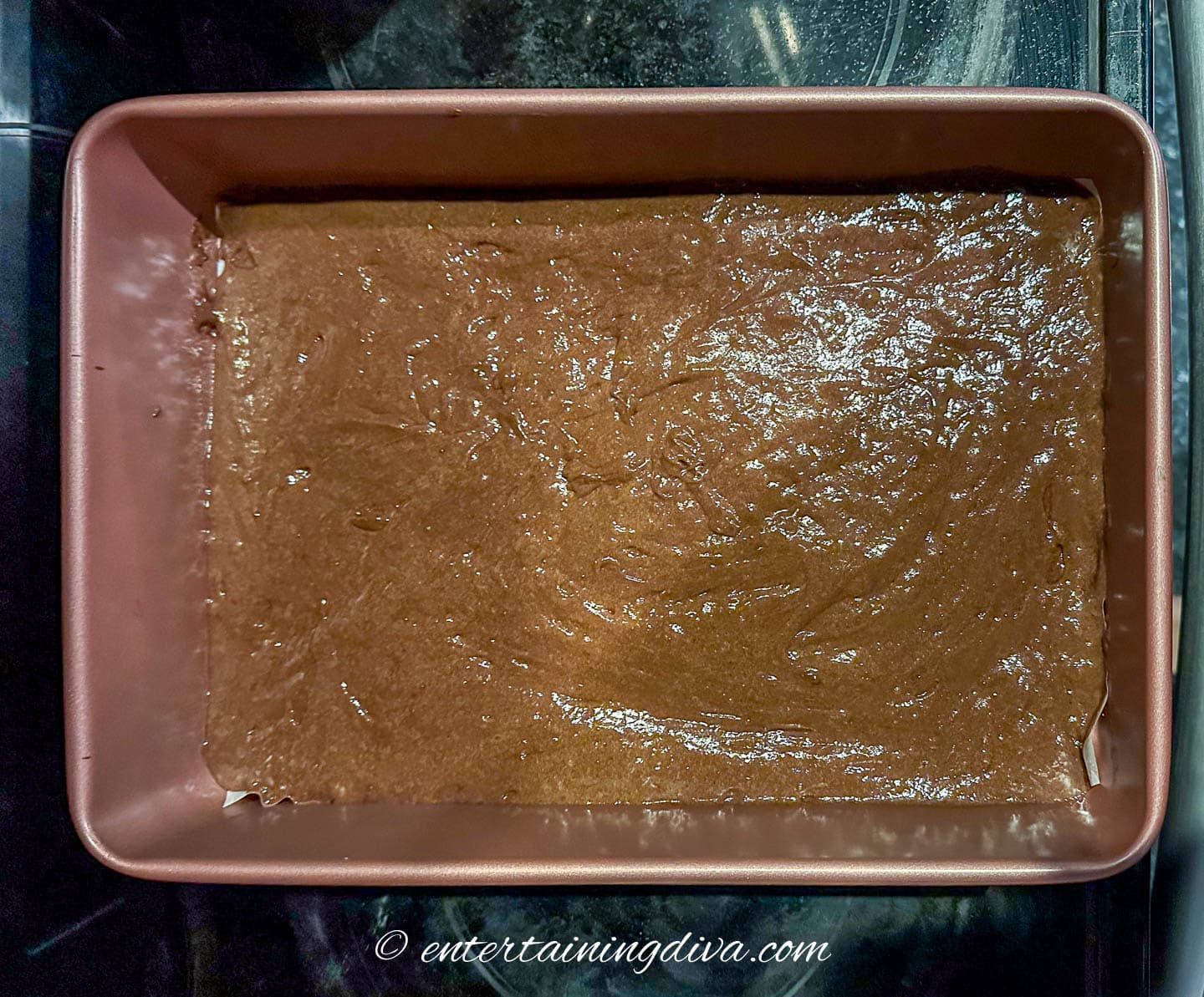 soda cake in a sheet pan before baking