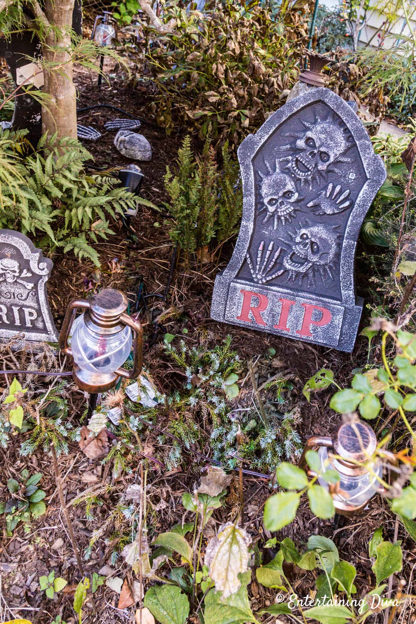 Halloween graveyard with gravestones during the day