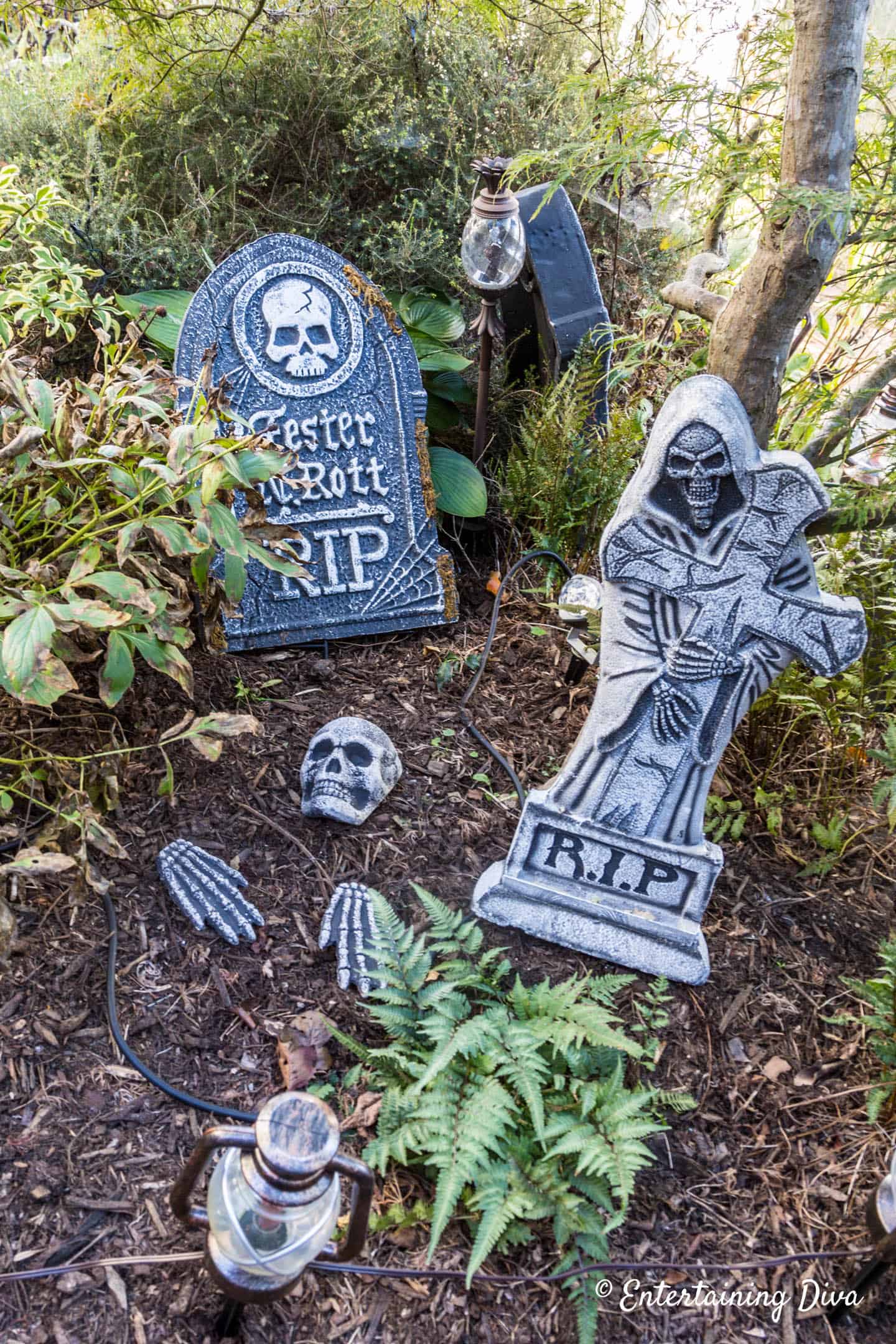 Skeleton bones scattered in front of tombstones in a Halloween cemetery