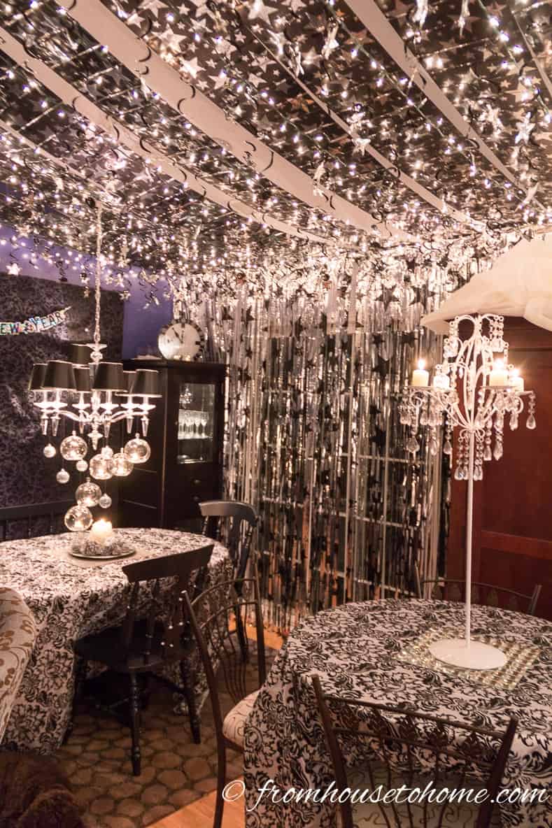 White lights and stars hung from the ceiling | Easy Last Minute New Year's Eve Party Decorations Ideas