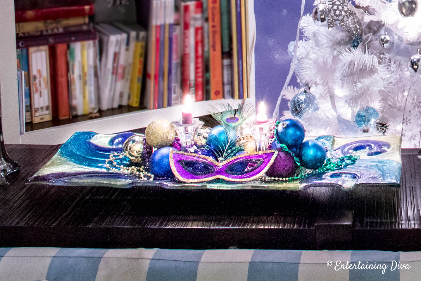 Mardi Gras table centerpiece with mask and beads