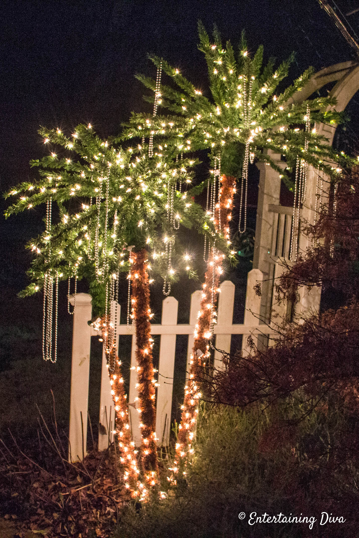 Faux palm trees with Mardi Gras beads