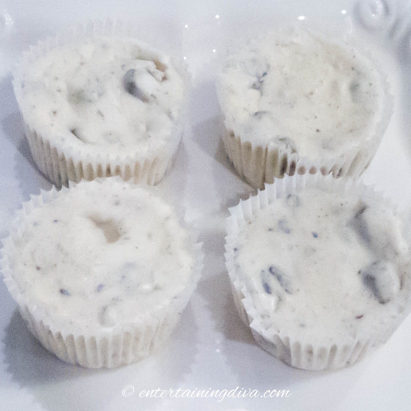 4 mini Oreo cheesecakes on a plate