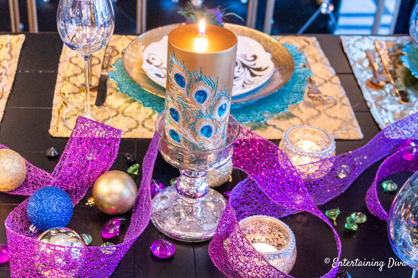 Peacock inspired centerpiece as Mardi Gras table decor