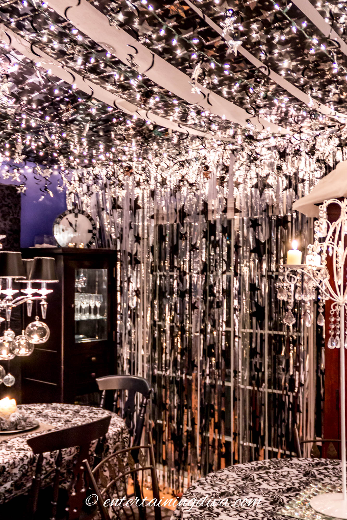 Silver curtains with black stars | 15 Fabulous Oscar Party Ideas