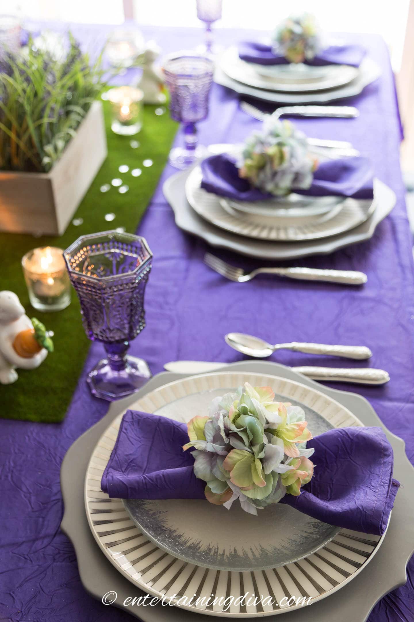Lengthwise view of the purple and gold Easter table setting