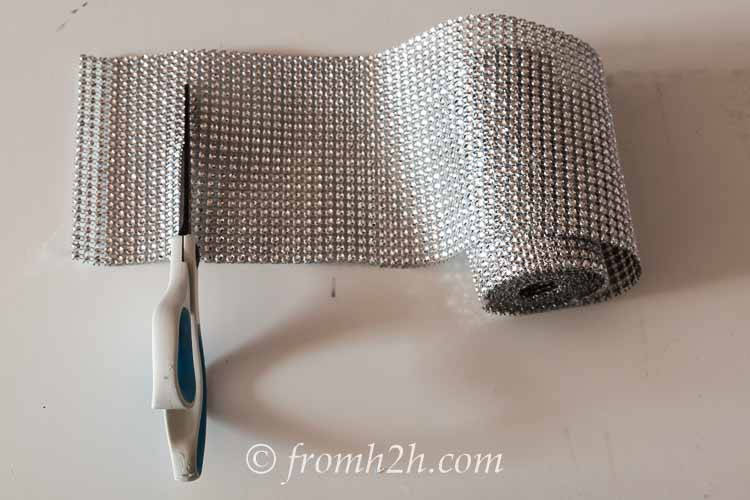 Cut the rhinestone ribbon to the width you want your napkin ring to be | Easy and Inexpensive DIY Sparkle Napkin Rings