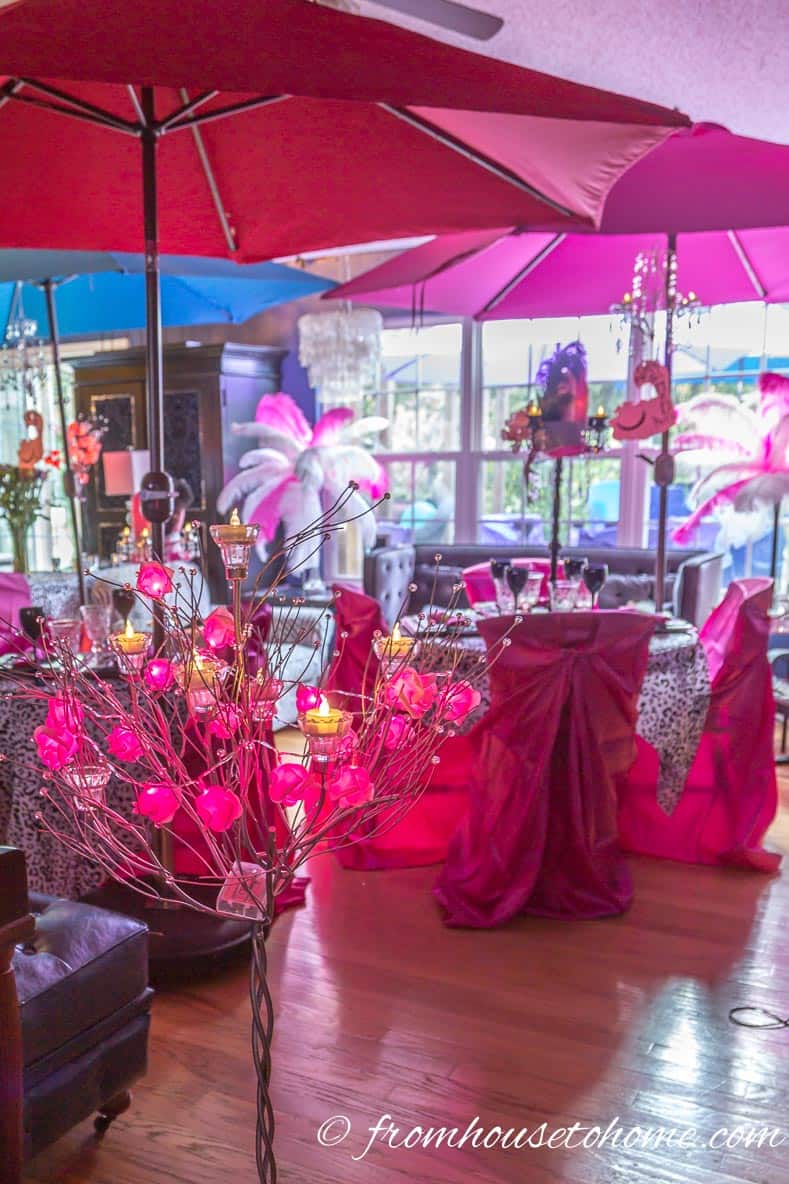 Alice in wonderland umbrellas and red rose lights | Mad Hatter Tea Party Ideas