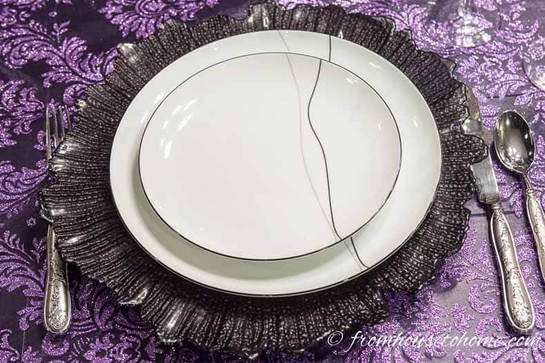 Purple thanksgiving table black and white plates