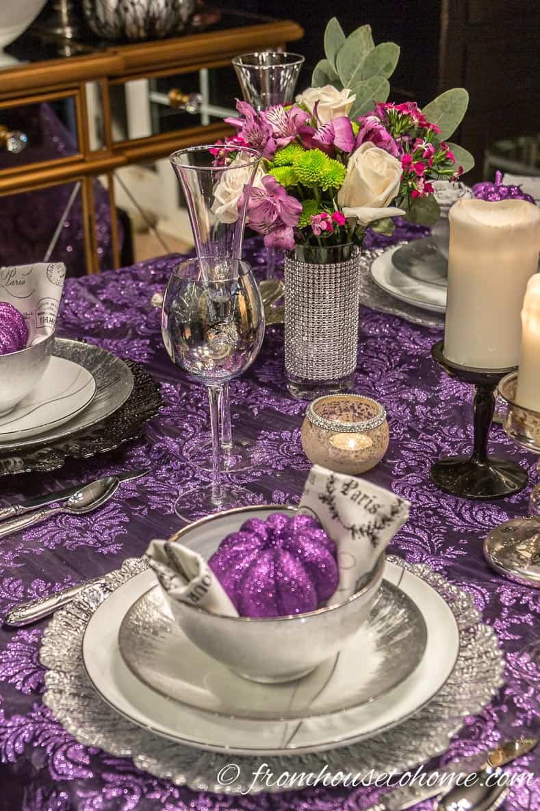 Purple Thanksgiving table centerpiece with flowers