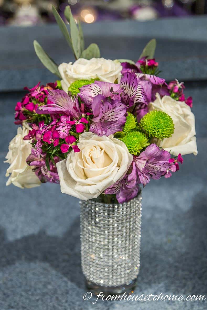Flowers in a highball glass are an easy and inexpensive centerpiece