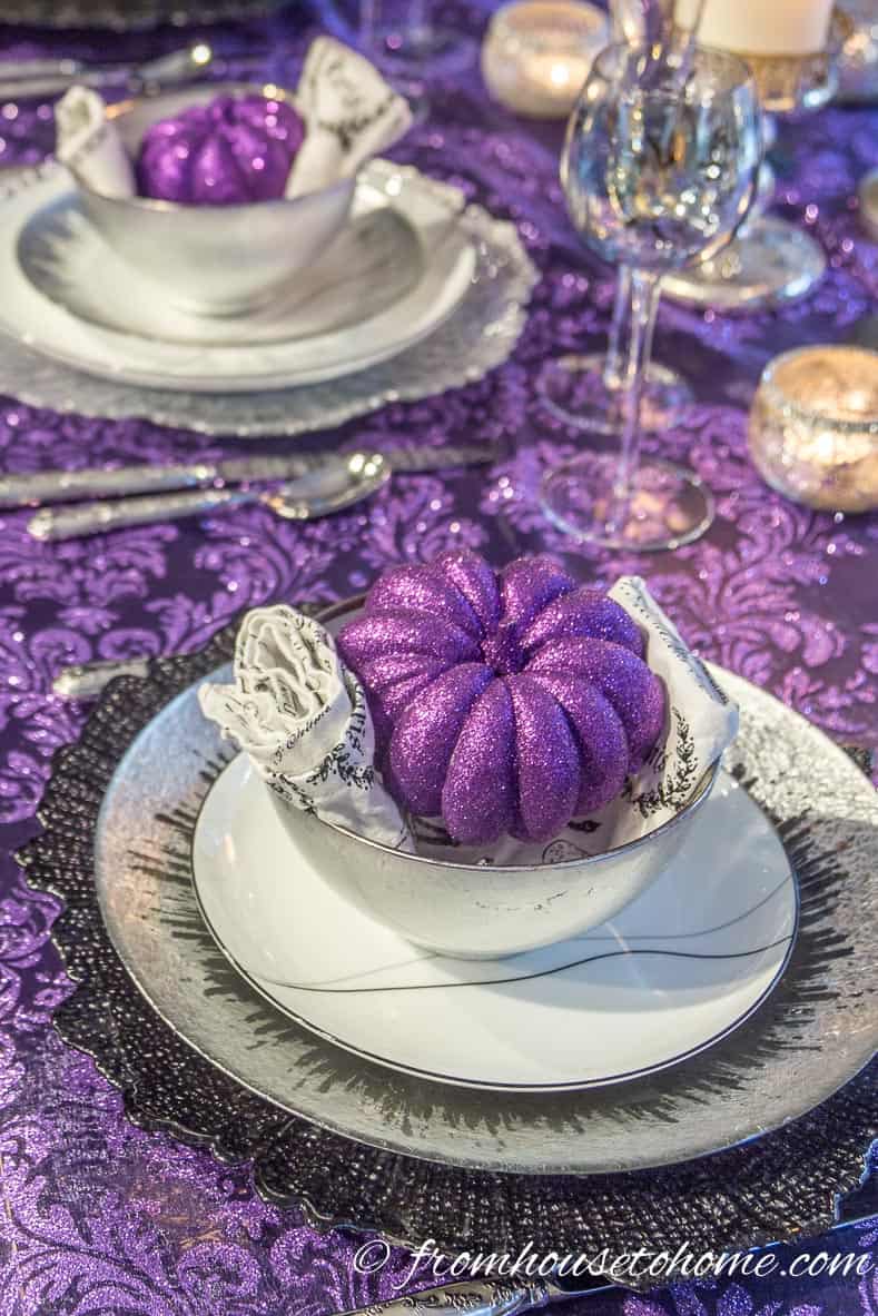 Purple thanksgiving table with glitter pumpkins