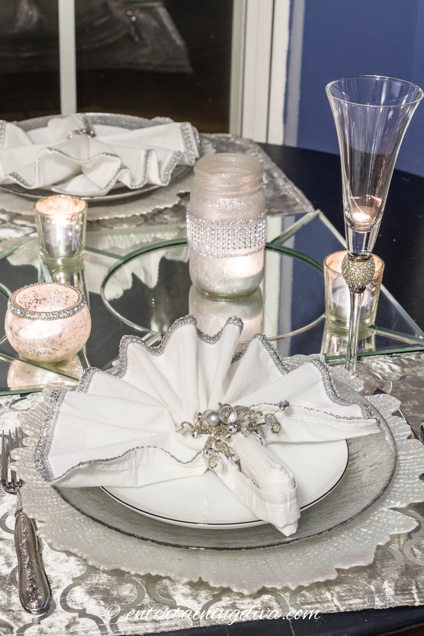 Silver and white table setting goes with the winter theme | Silver and White Winter Table Setting