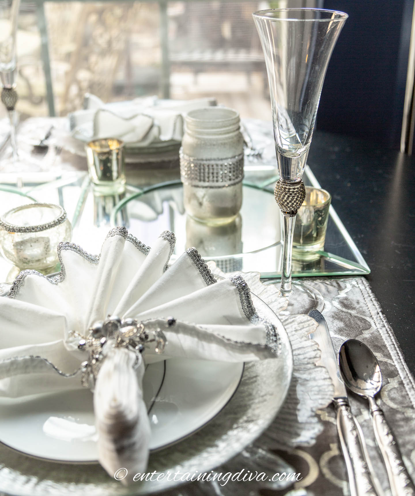 The flutes go with the silver and white table setting | Silver and White Winter Table Setting