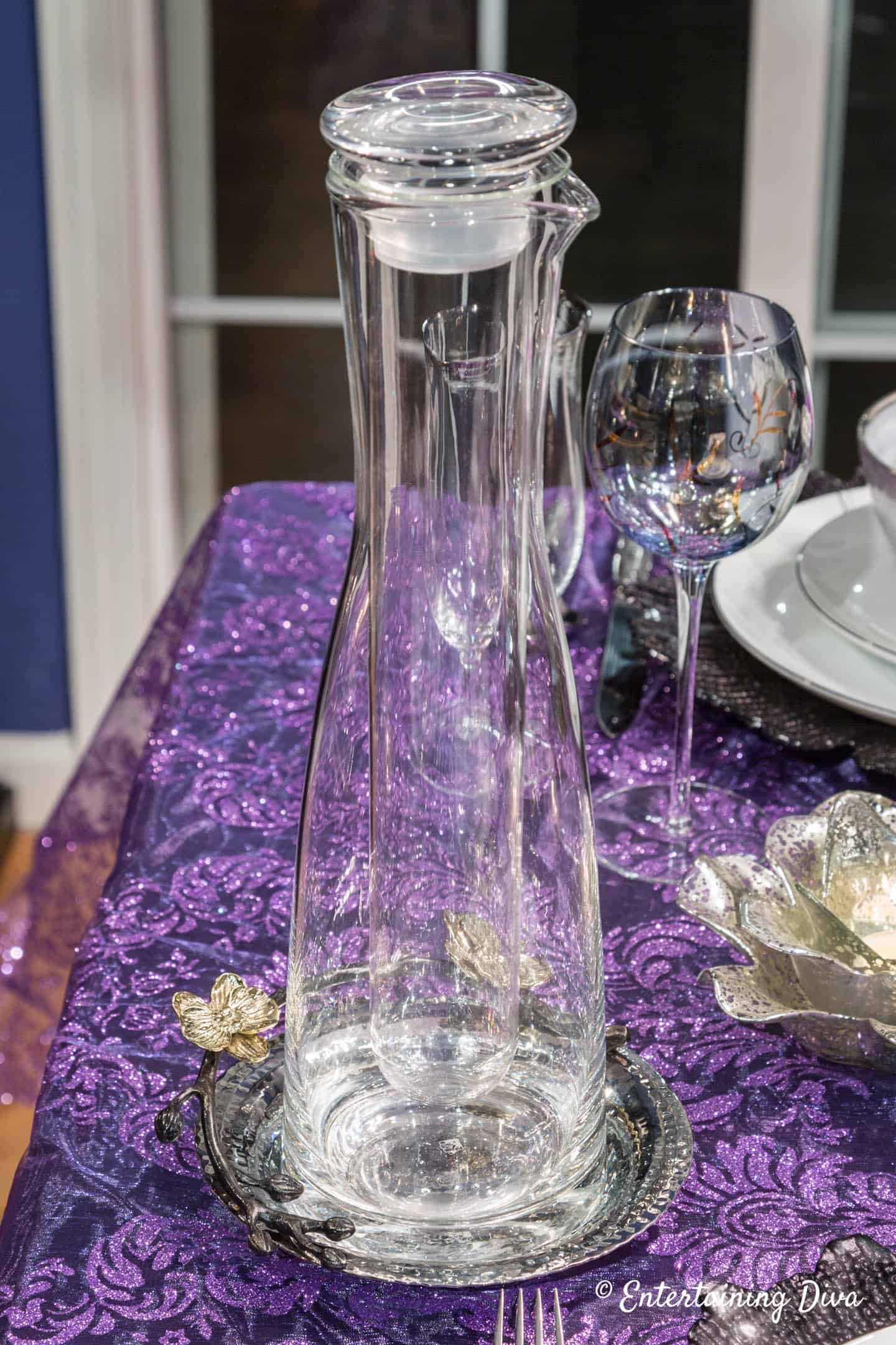 Wine carafe on a holiday dinner party table