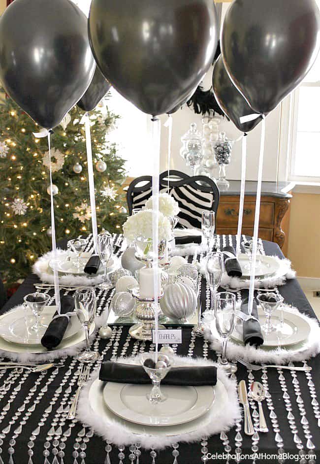 Balloons make an interesting table decoration via celebrationsathomeblog.com | Easy Last Minute New Year's Eve Party Decorations Ideas