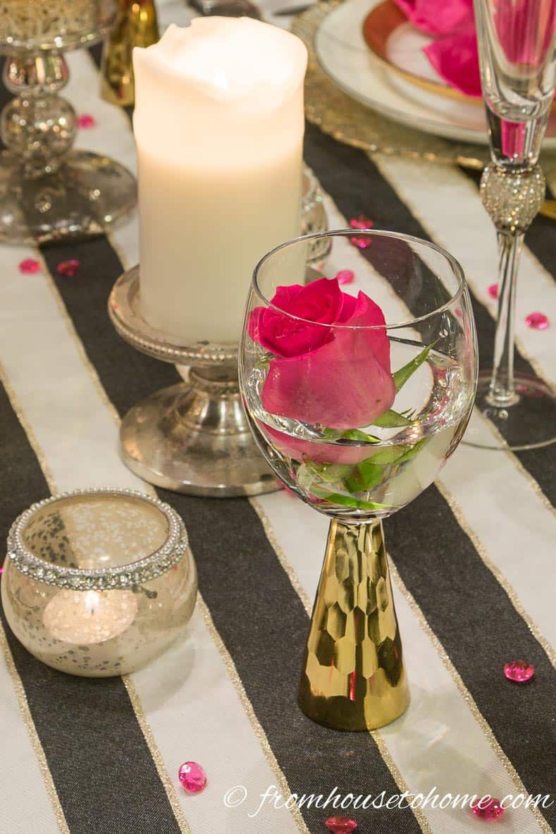 Pink roses in gold stemmed wine glasses | Kate Spade Inspired Table Setting