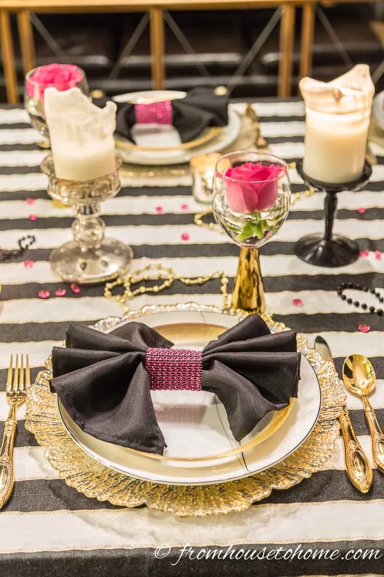 Add black napkins with pink napkin rings to echo the pink roses | Kate Spade Inspired Table Setting
