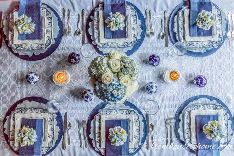  | Hydrangea-inspired Blue and White Tablescape | If you're looking for Easter dinner or spring table ideas, this blue and white table setting has a hydrangea centerpiece that is perfect for the occasion. The blue and white place setting is really pretty, too.