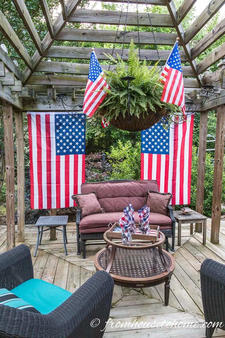 Small flags in a hanging basket are easy 4th of July patriotic decor