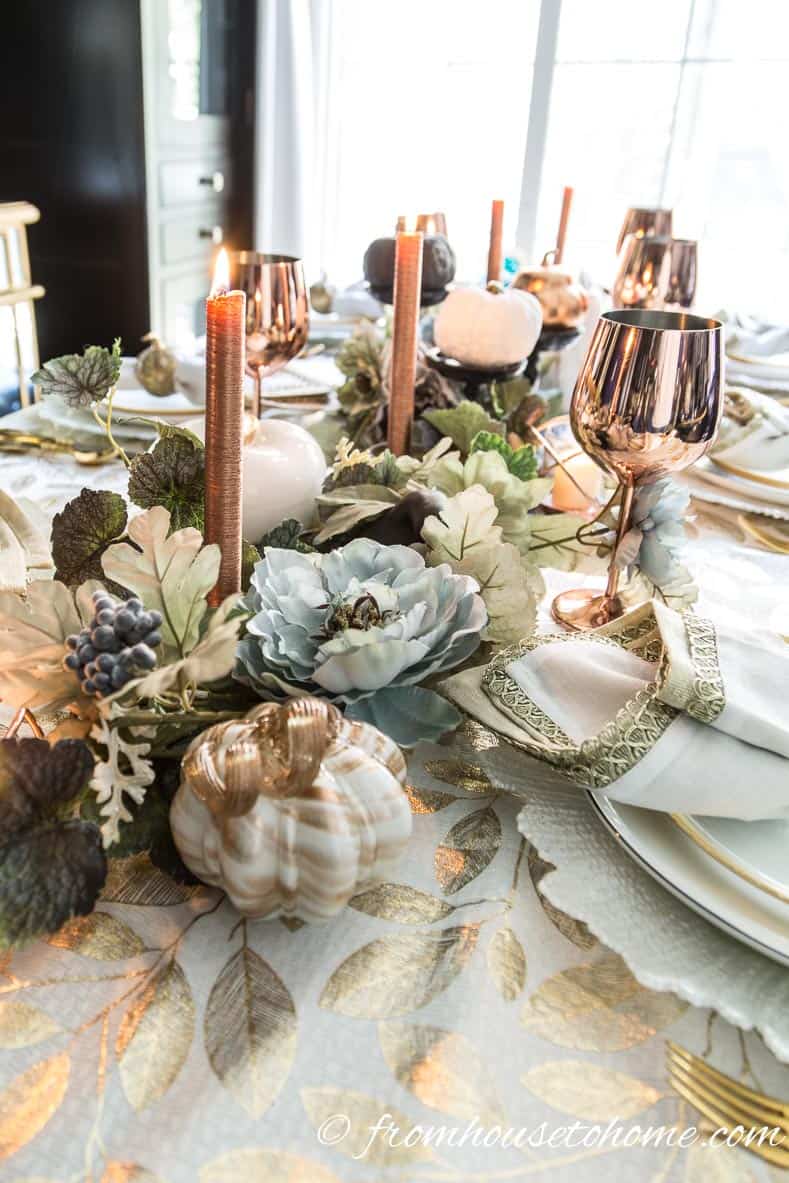 Copper fall table centerpiece with vines and copper candles