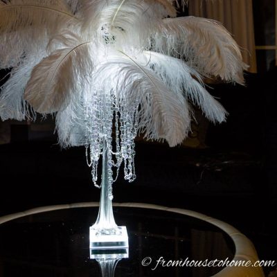 Gatsby DIY feather centerpiece with lights and hanging crystals