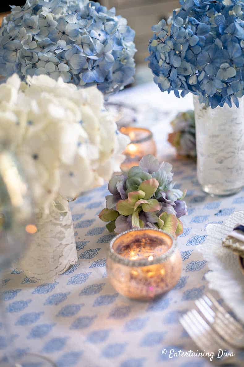 Blue and white hydrangeas on a blue and white tablecloth