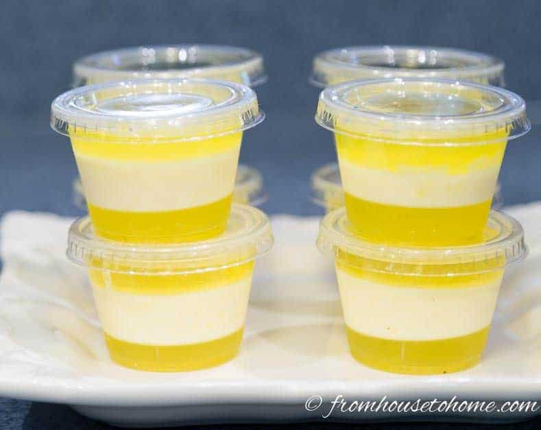 These easy white Pina Colada jello shots are the best! They are made with real pineapple juice, coconut milk and Malibu rum...just like the real drinks. Perfect for summer parties. #EntertainingDiva #summerfun #jelloshots #cocktails #drinks pina colada jello shots