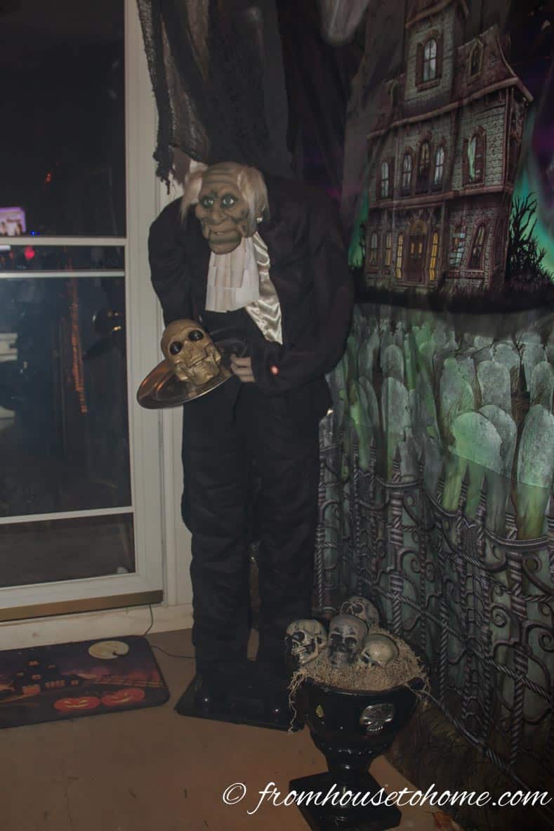 Graveyard Scene Setter on the front porch with Halloween decorations