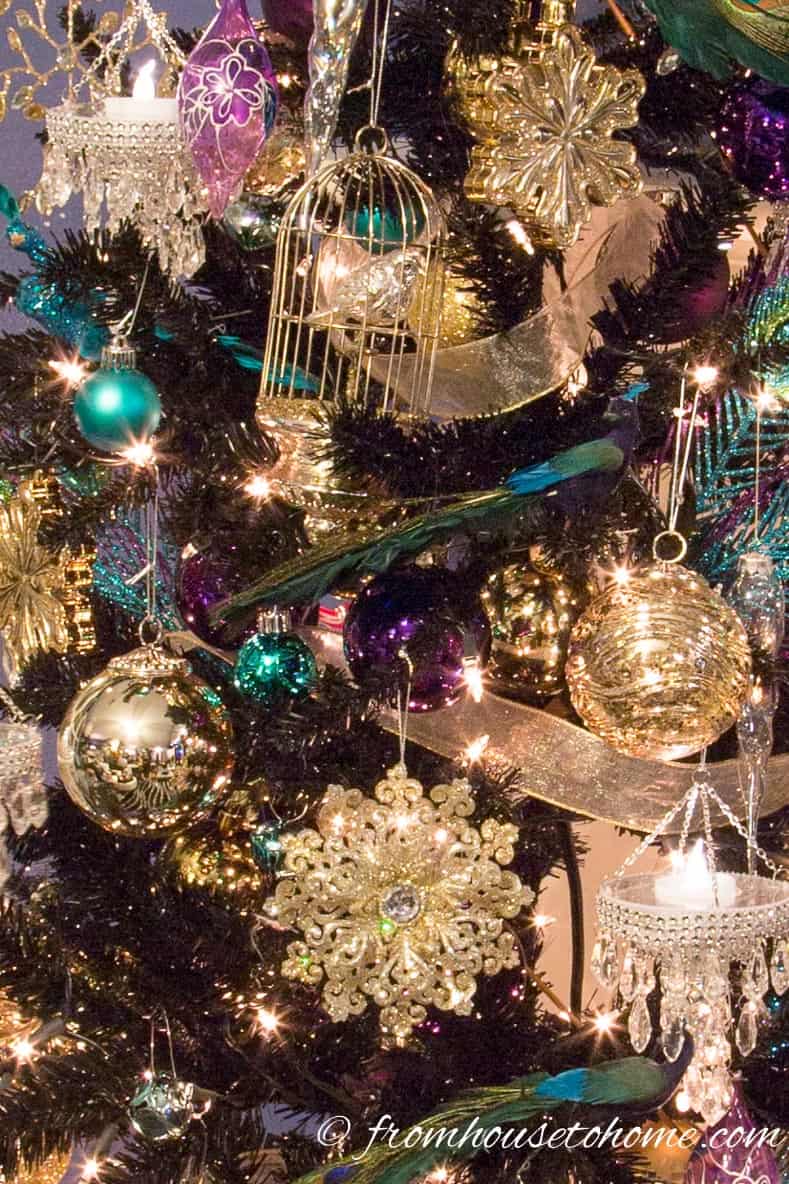 Peacock colored ornaments on a Christmas tree