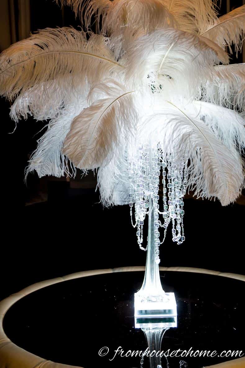 Glam feather centerpiece for Great Gatsby New Year's Eve party theme