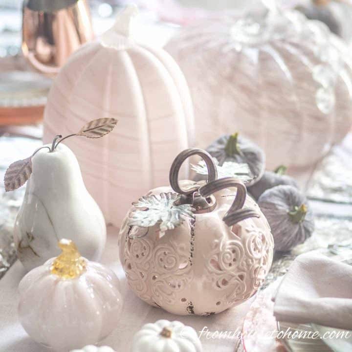 blush pink pumpkins on a table
