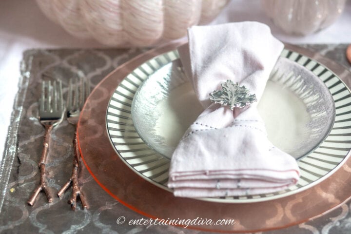 Layered pink and silver table setting