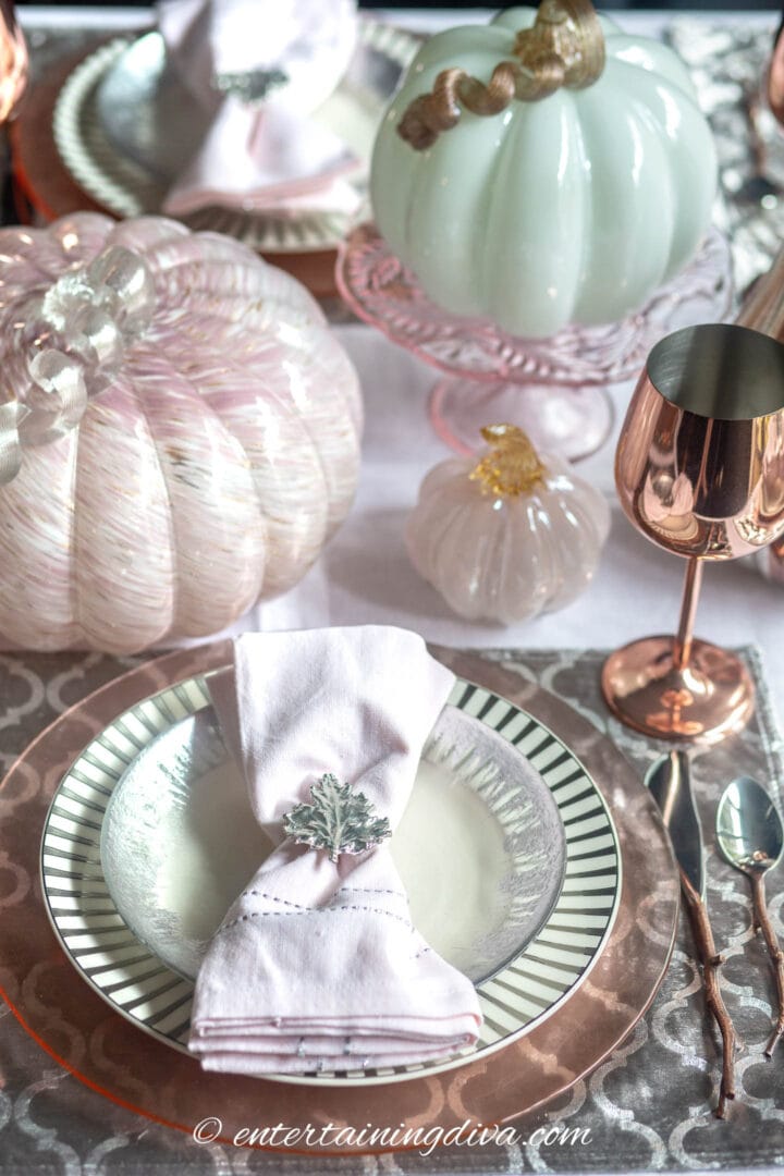 Pink and silver fall tablescape with copper wine glass