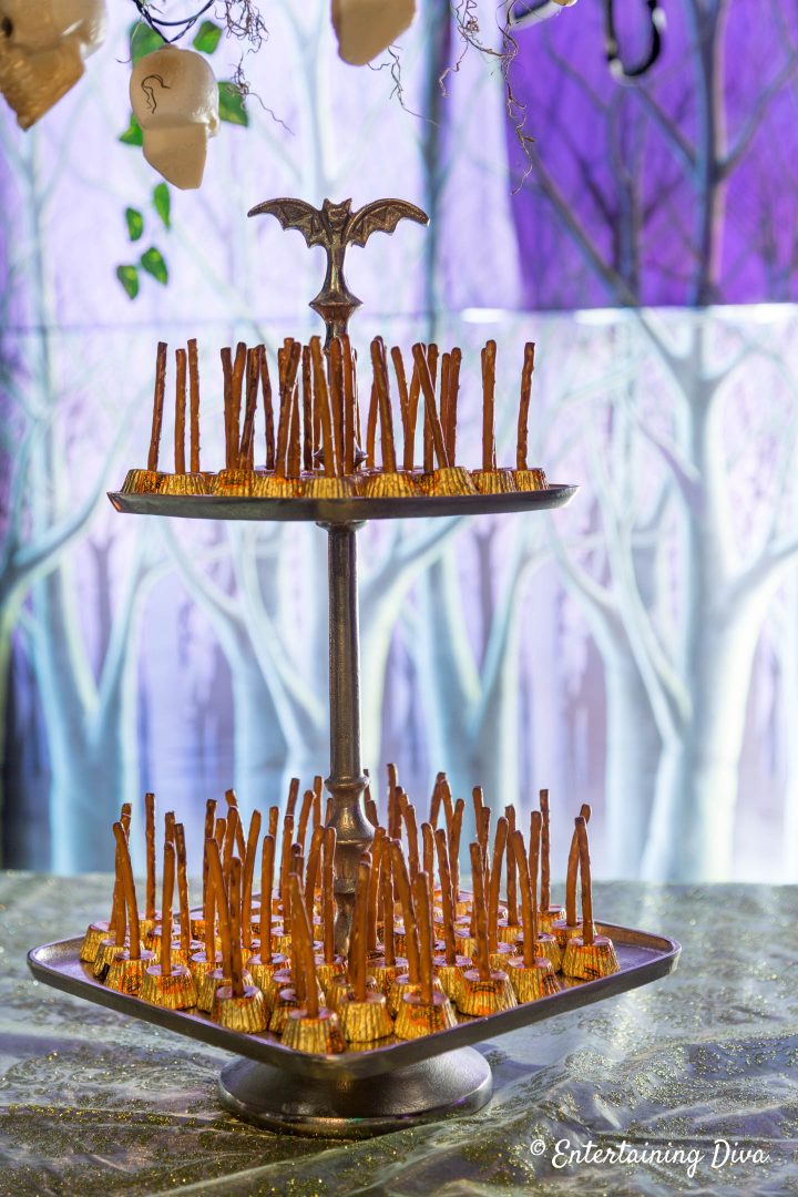 Harry Potter party broomsticks made from Reese's cups and pretzels