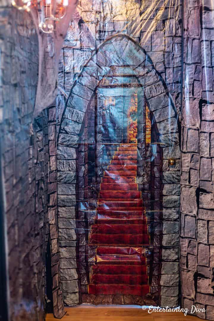 Harry Potter party brick wall scene setter with picture of "moving" stairs