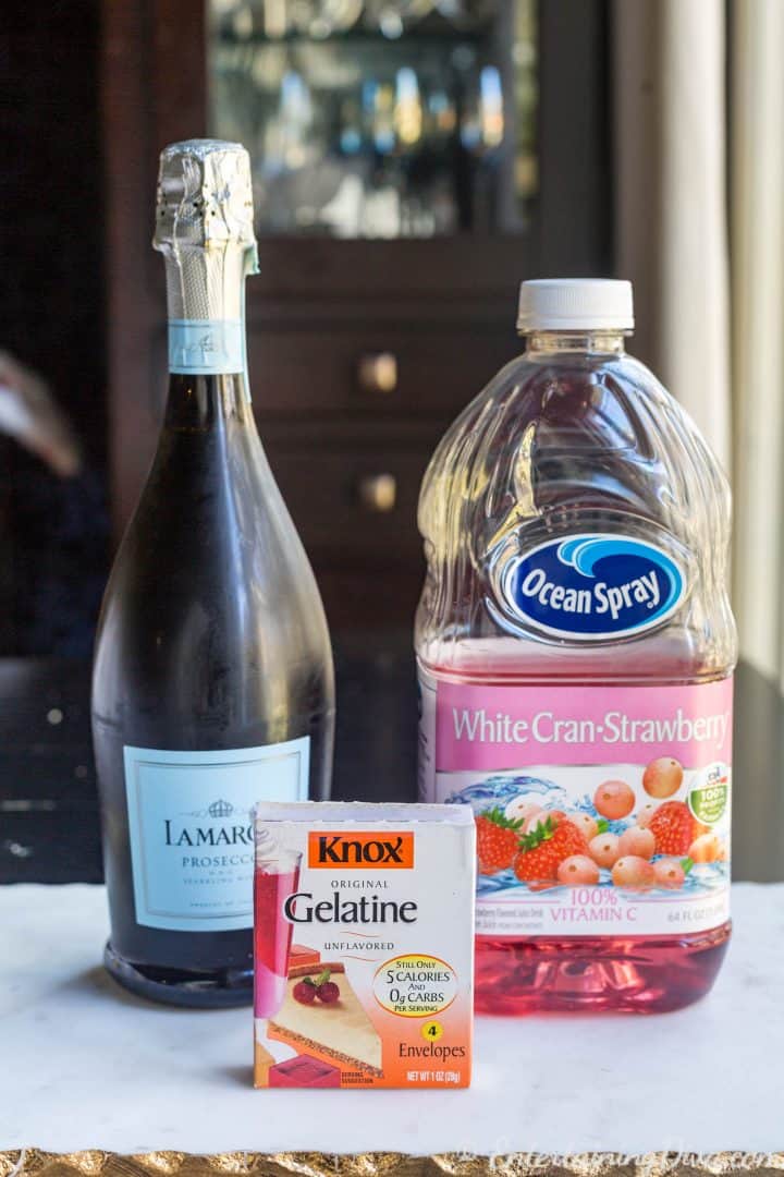 Pink champagne jelly shots recipe ingredients - Champagne, White cran strawberry juice and unflavored gelatin