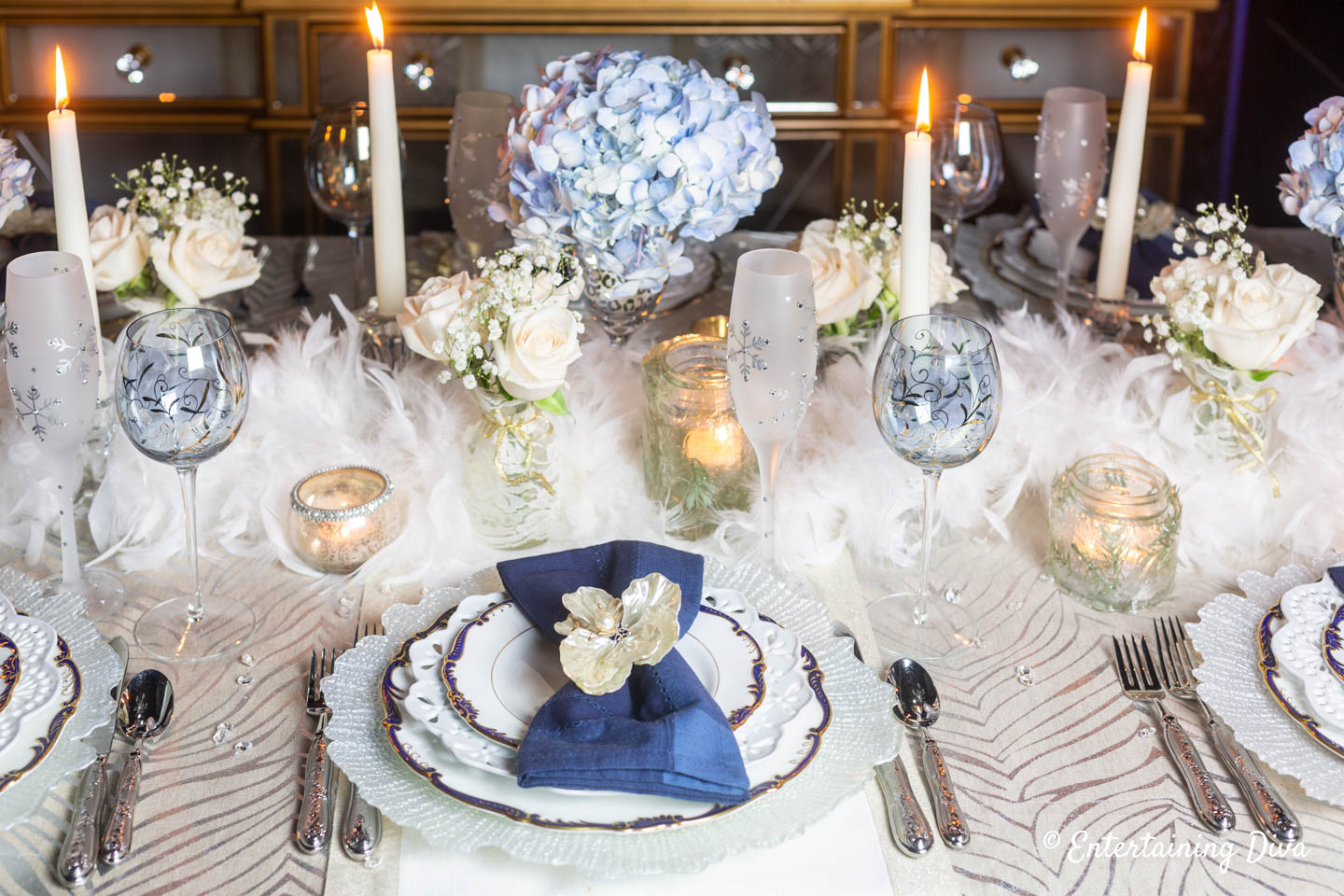 Blue, white, silver and gold winter wonderland table decor