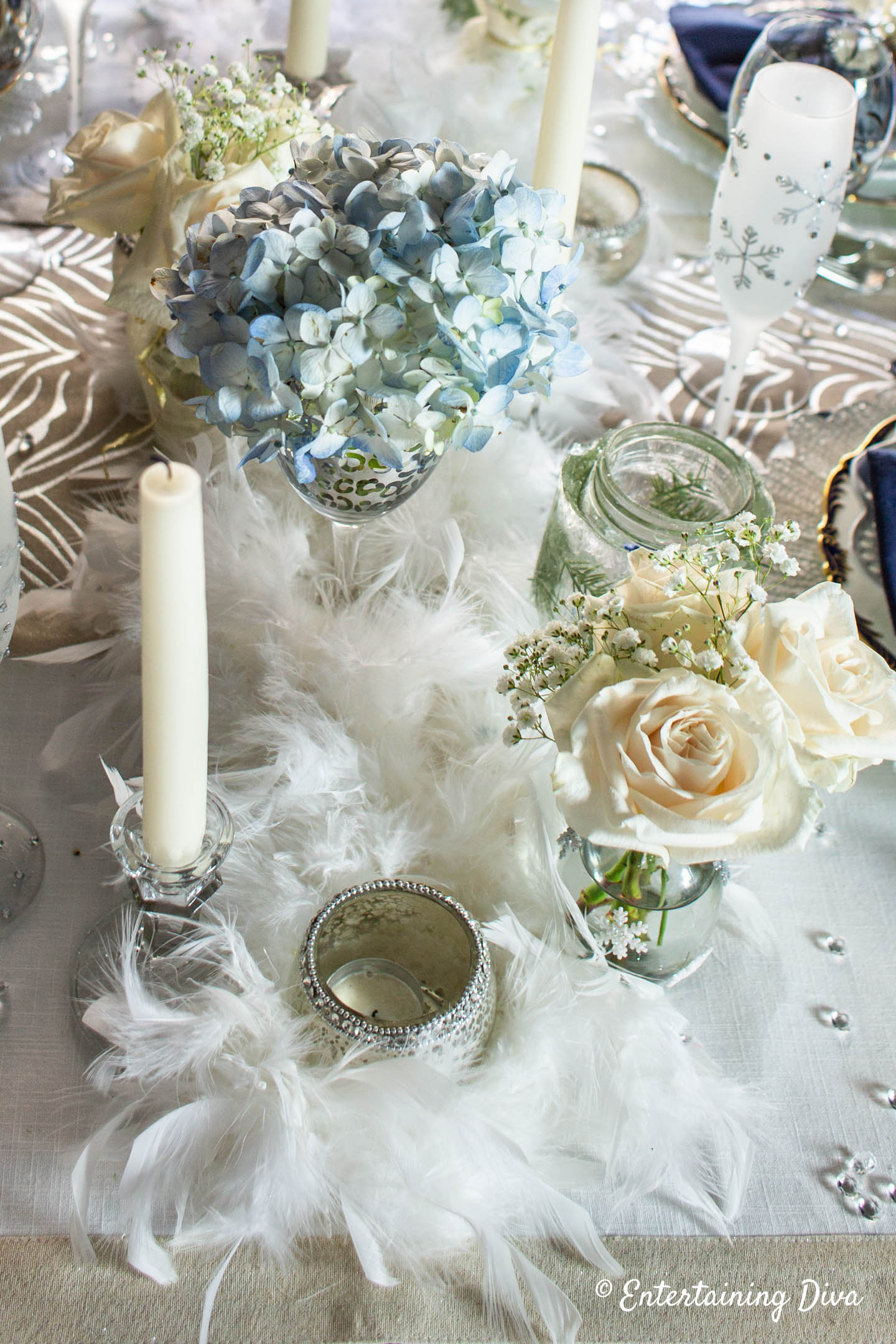 White feather boas on a winter wonderland tablescape