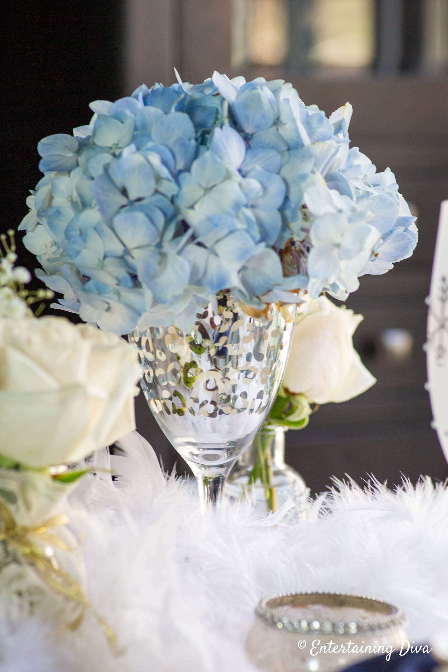 Blue hydrangea in a silver wine glass