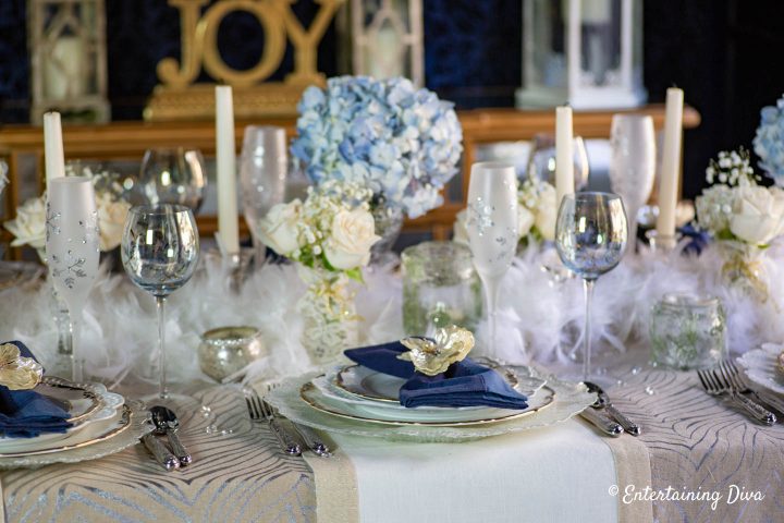 Blue, white, silver and gold winter wonderland table decor